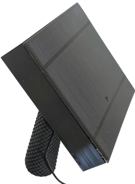 Hand-held EMF sensor with gridded antenna panel, used to capture electromagnetic noise